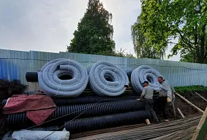 Дренажная гофрированная труба d110 с перфорацией В ФИЛЬТРЕ (50м) 9